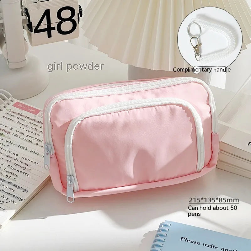 Double-layer high-capacity pencil case with carry handle in solid colour
