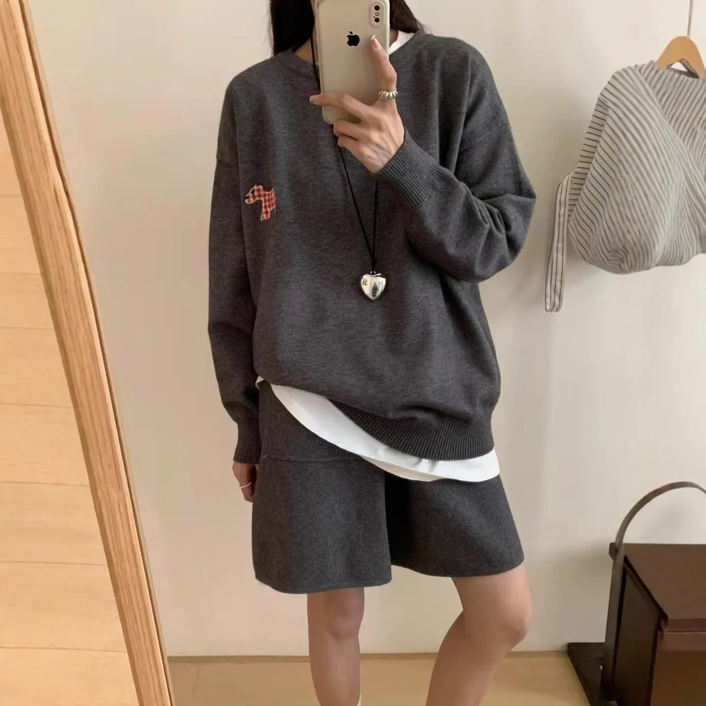 Women's milk blue knitted sweater and shorts suit with embroidered animal pattern.