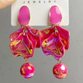 Long flower earrings in alloy with silver or gold plating, shown in purple, yellow, fairy white, rose red and nude pink