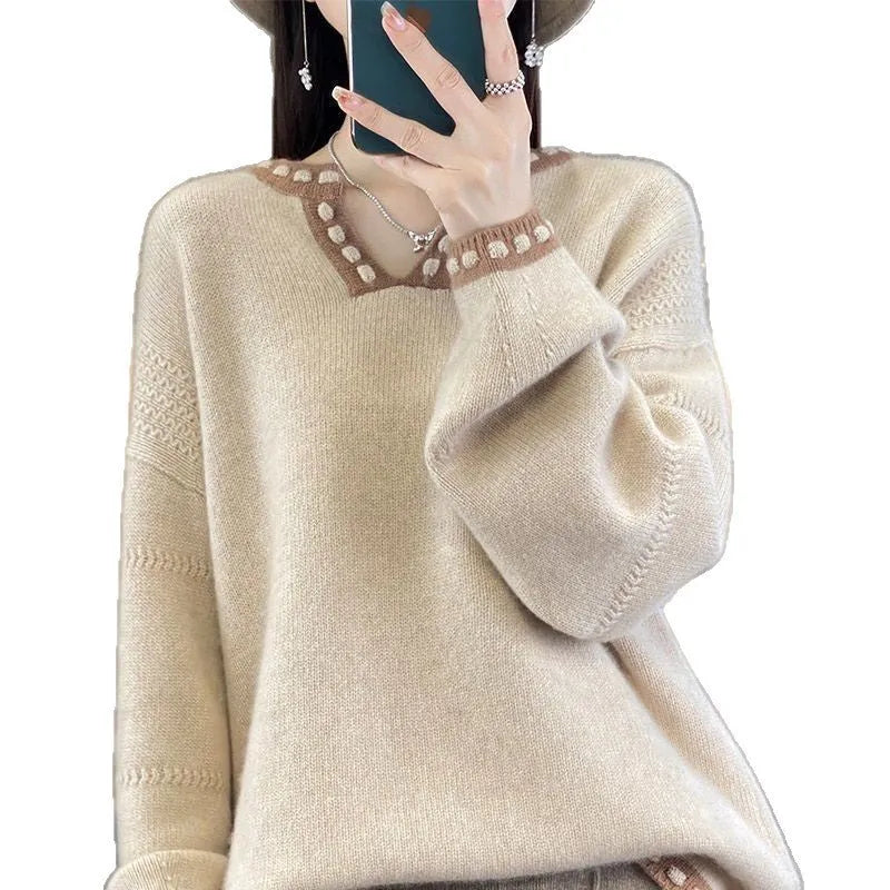 Women's camel-coloured V-neck long sleeve viscose pullover sweater on a hanger.