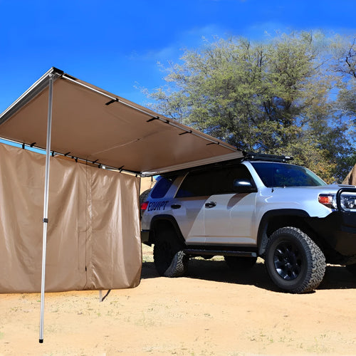 Black glue waterproof camping tent with aluminium poles set up outdoors showing two-bedroom interior