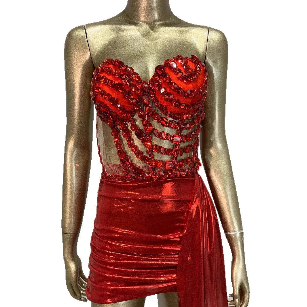 Red women's spandex skirt suit with see-through hollow mesh panels for stage performance.