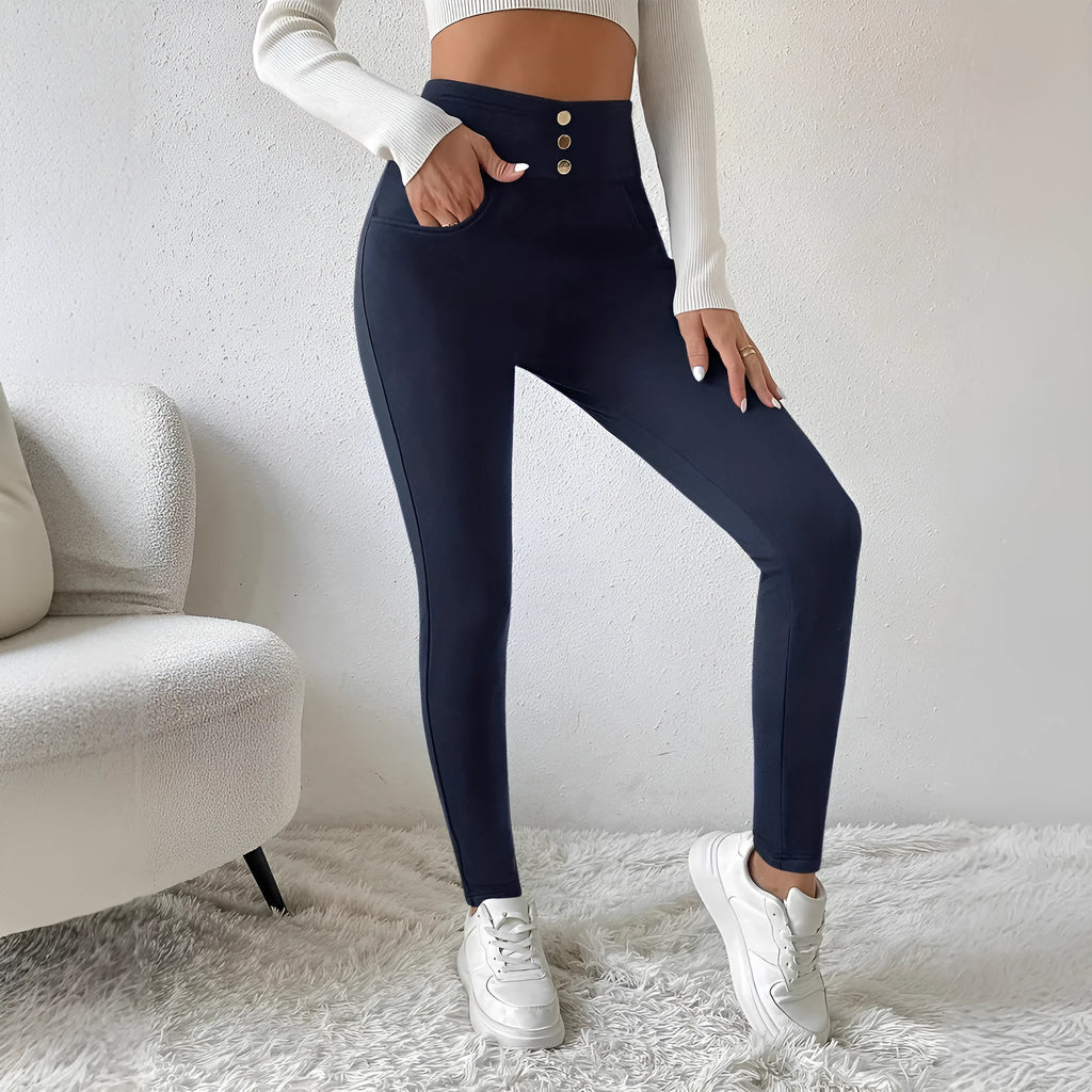 Navy blue women's high-waist trousers with straight-leg fit on hanger