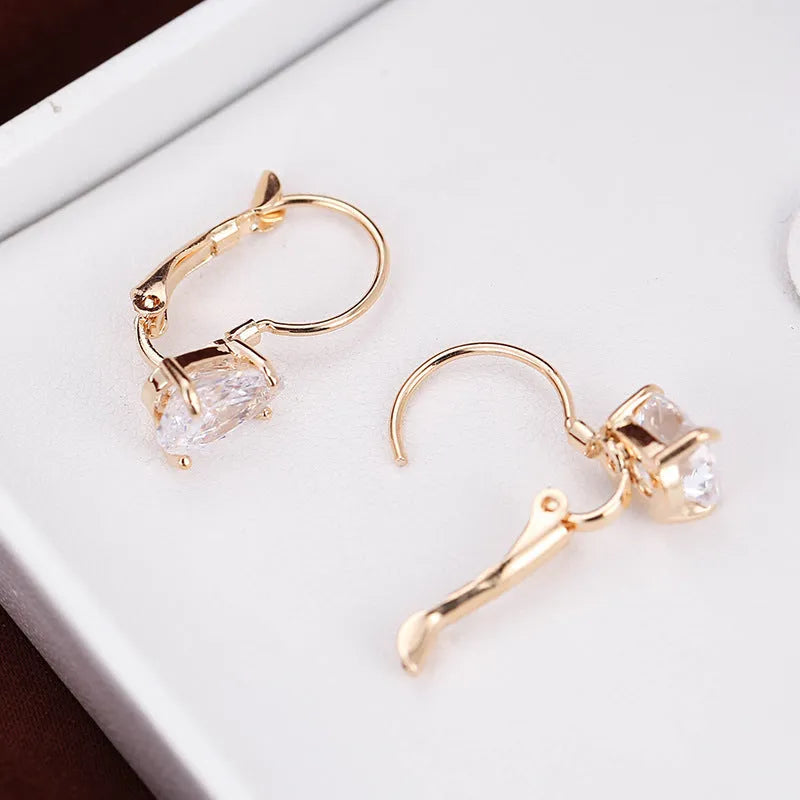Women's drop-shaped copper earrings with platinum inlay in gold colour