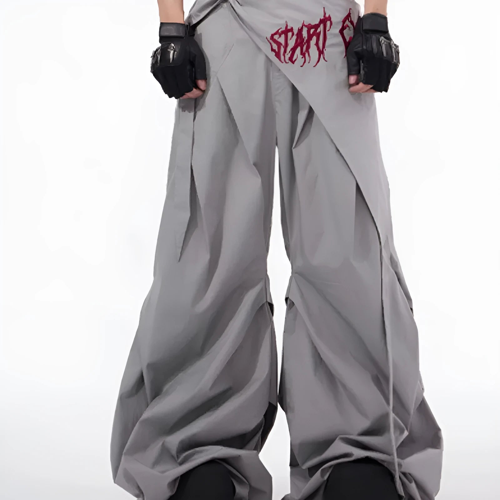 Boy modelling black wide-leg summer pants in a refined Korean style