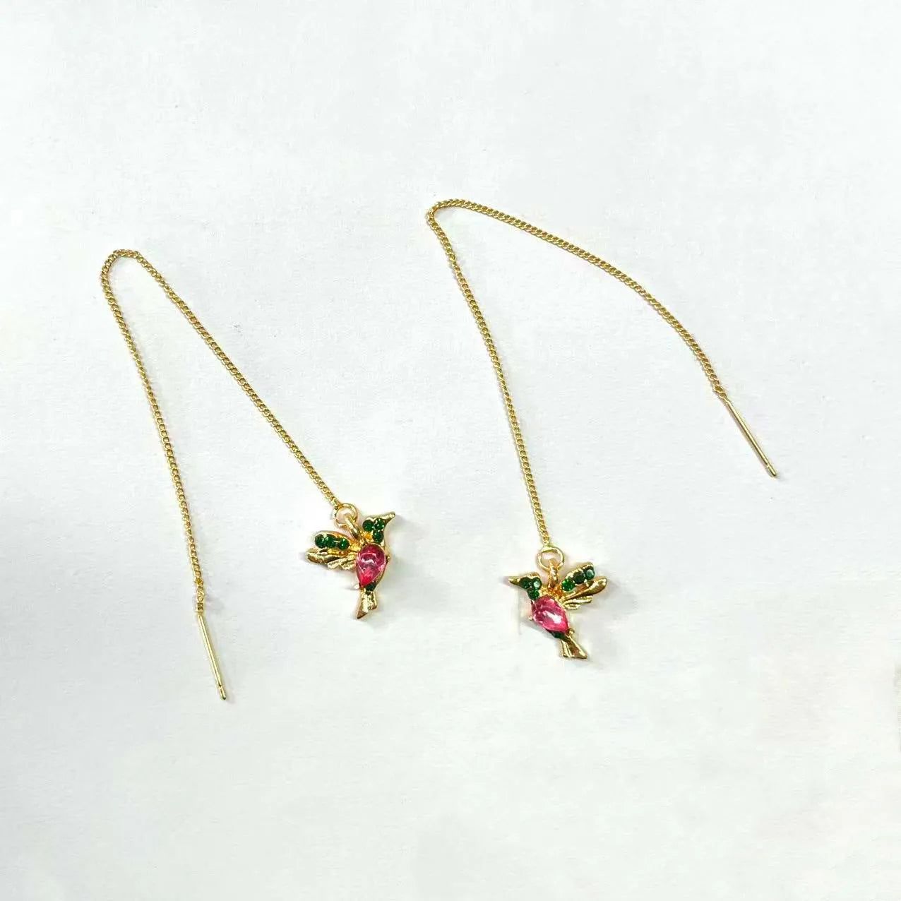Bird hanging earrings for women in long style with mixed zirconium wings on electroplated alloy.