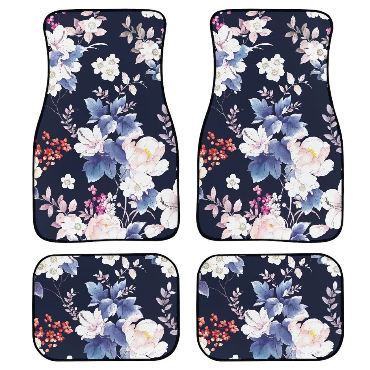 Set of four black rubber car floor mats with a textured surface and raised edges, shown in a vehicle footwell.