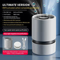 White desktop air purifier on a table with USB cable and aromatherapy tablets