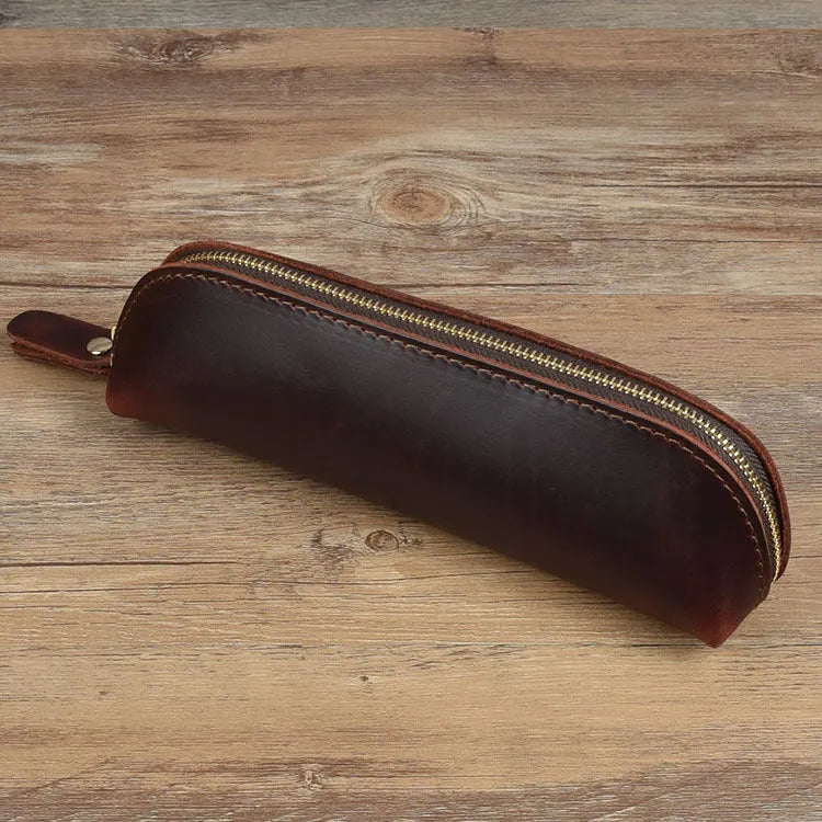 Genuine cowhide leather pencil case with zipper closure measuring 18cm long