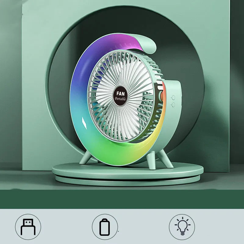 Desktop mini fan with night light in grass green showing 180-degree tilt and USB port