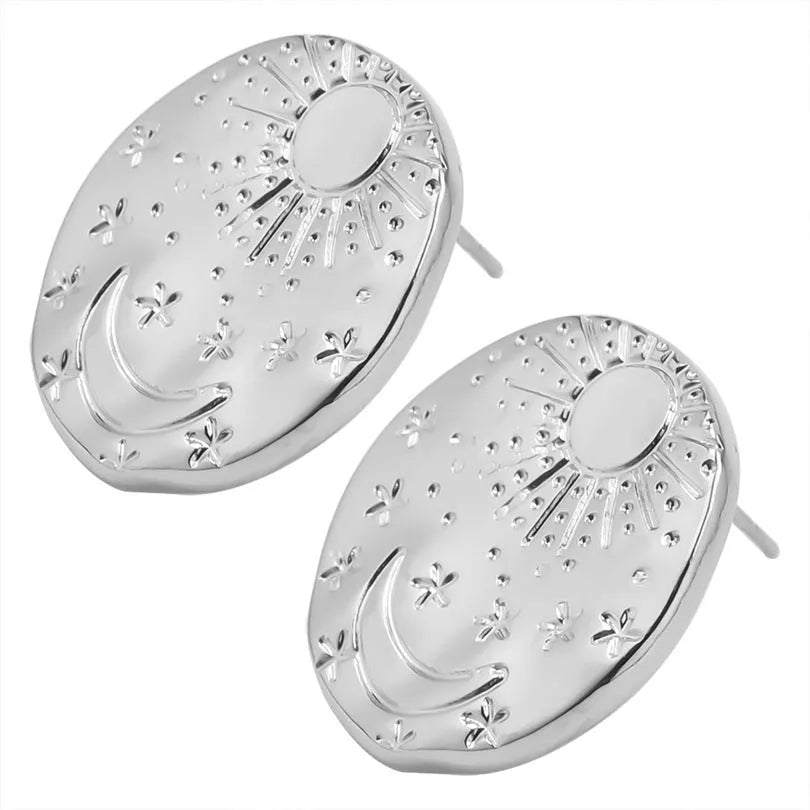 A pair of 304 stainless steel stud earrings with a geometric shape and shell detail in a gold or silver electroplated finish.
