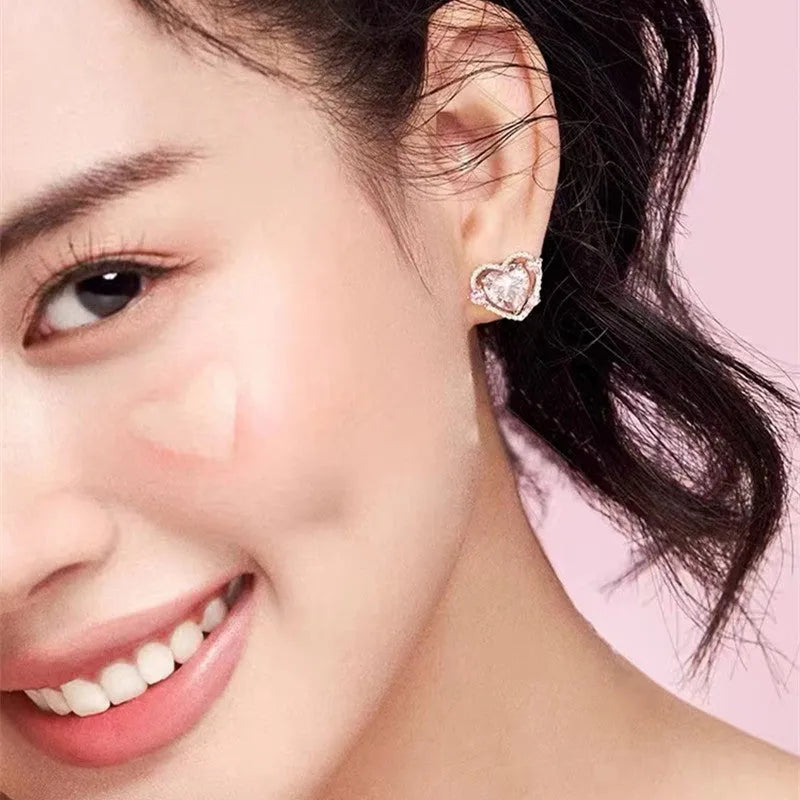 White K colour heart-shaped copper stud earrings for women with electroplated finish