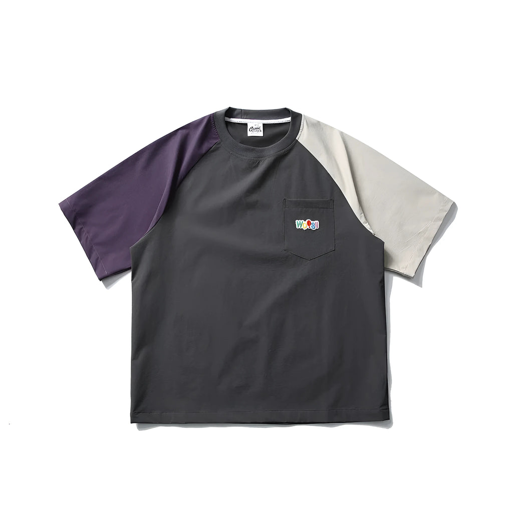 Dark grey men's t-shirt with contrast colour panels and raglan sleeves laid flat.