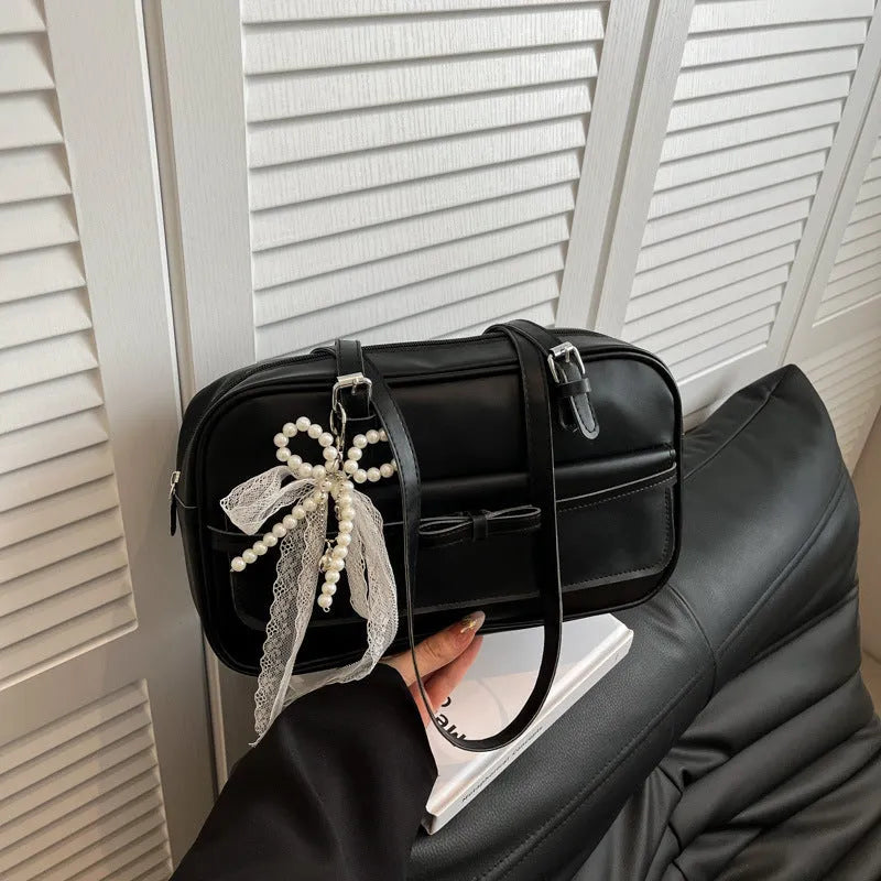 PU single-shoulder flap bag in horizontal square shape with bow stitching decoration