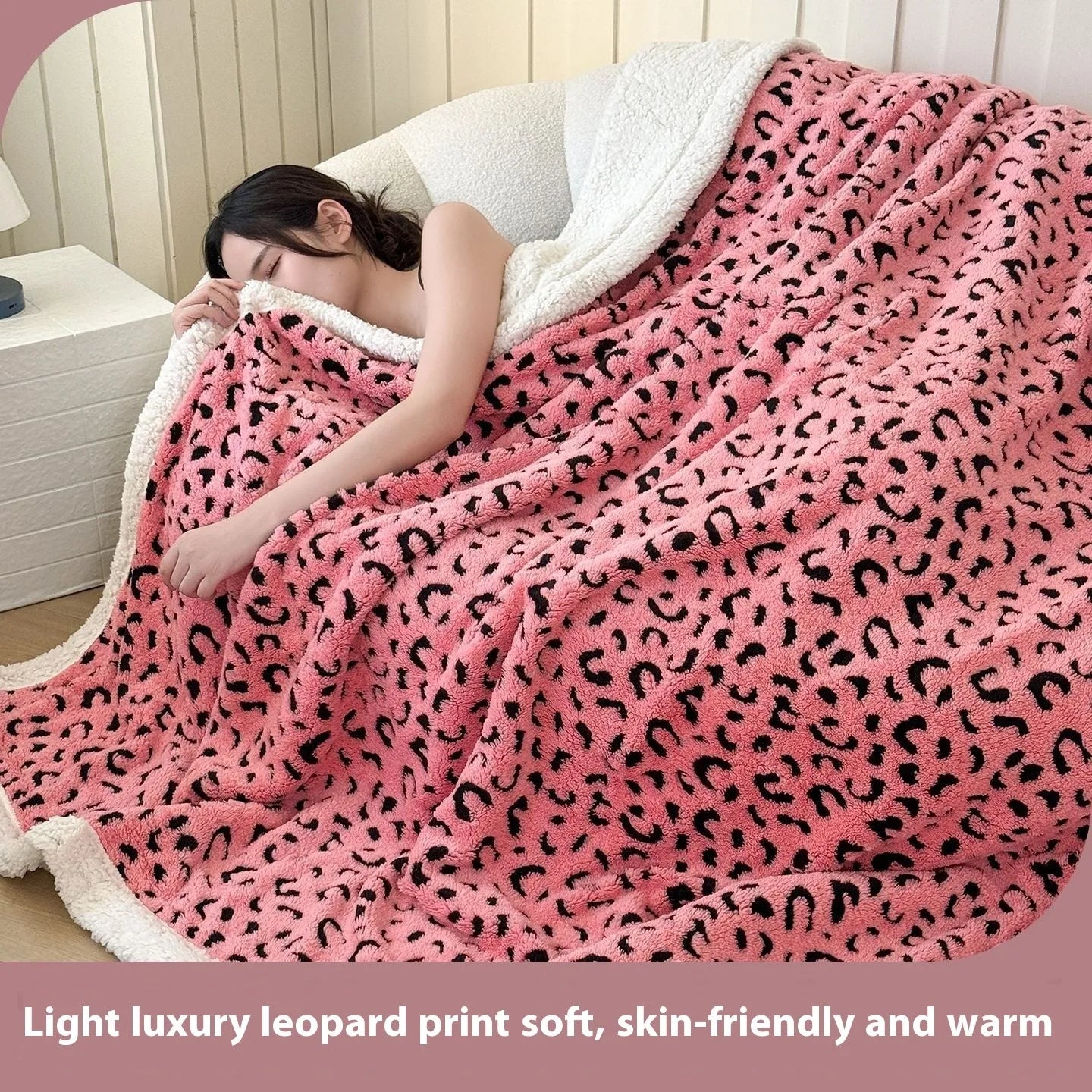 Double-layer cationic leopard jacquard taffeta blanket showing reversible design with zebra pattern
