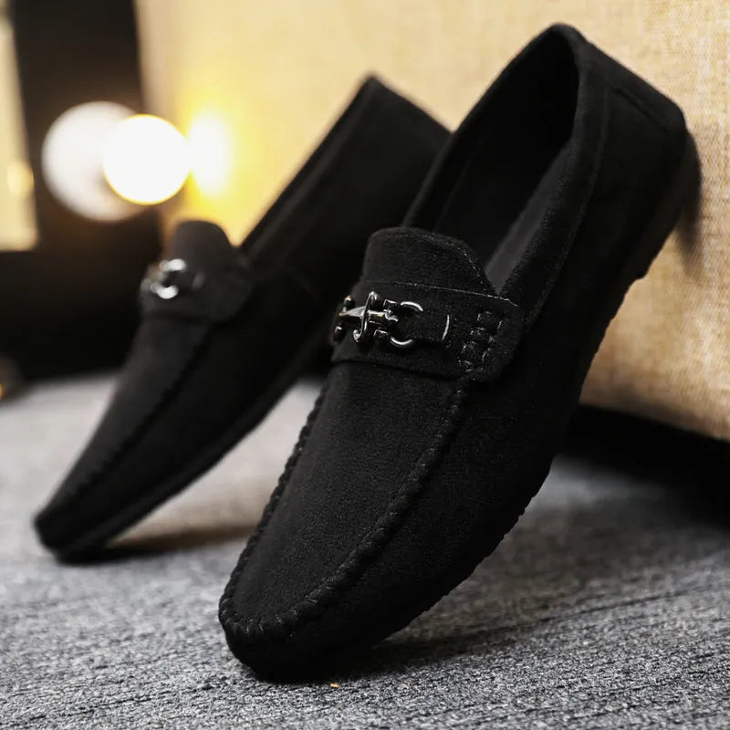 Waterproof men's slip-on loafers in black with round toe, low heel, and rubber sole