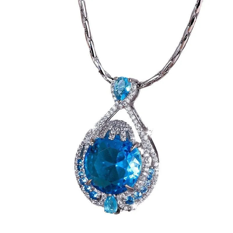 Geometric pendant necklace with blue crystal and water wave chain for women