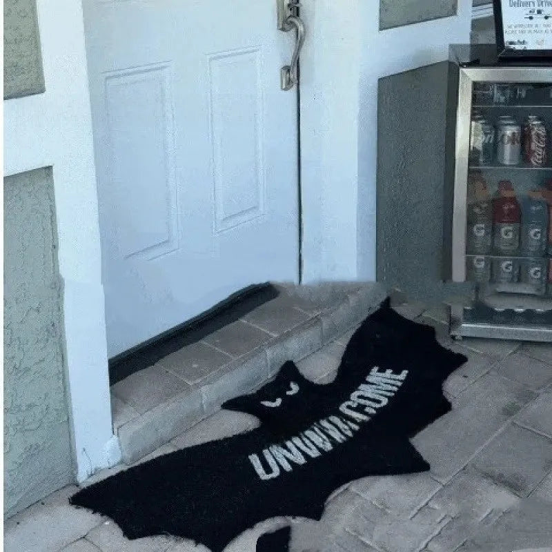 Bat-shaped plastic doormat measuring 80x40 centimetres in bat mat style