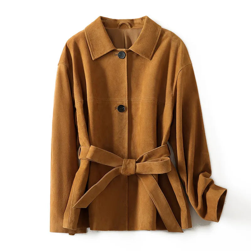 Yellow brown retro women's coat with Peter Pan collar and leather belt on a hanger.