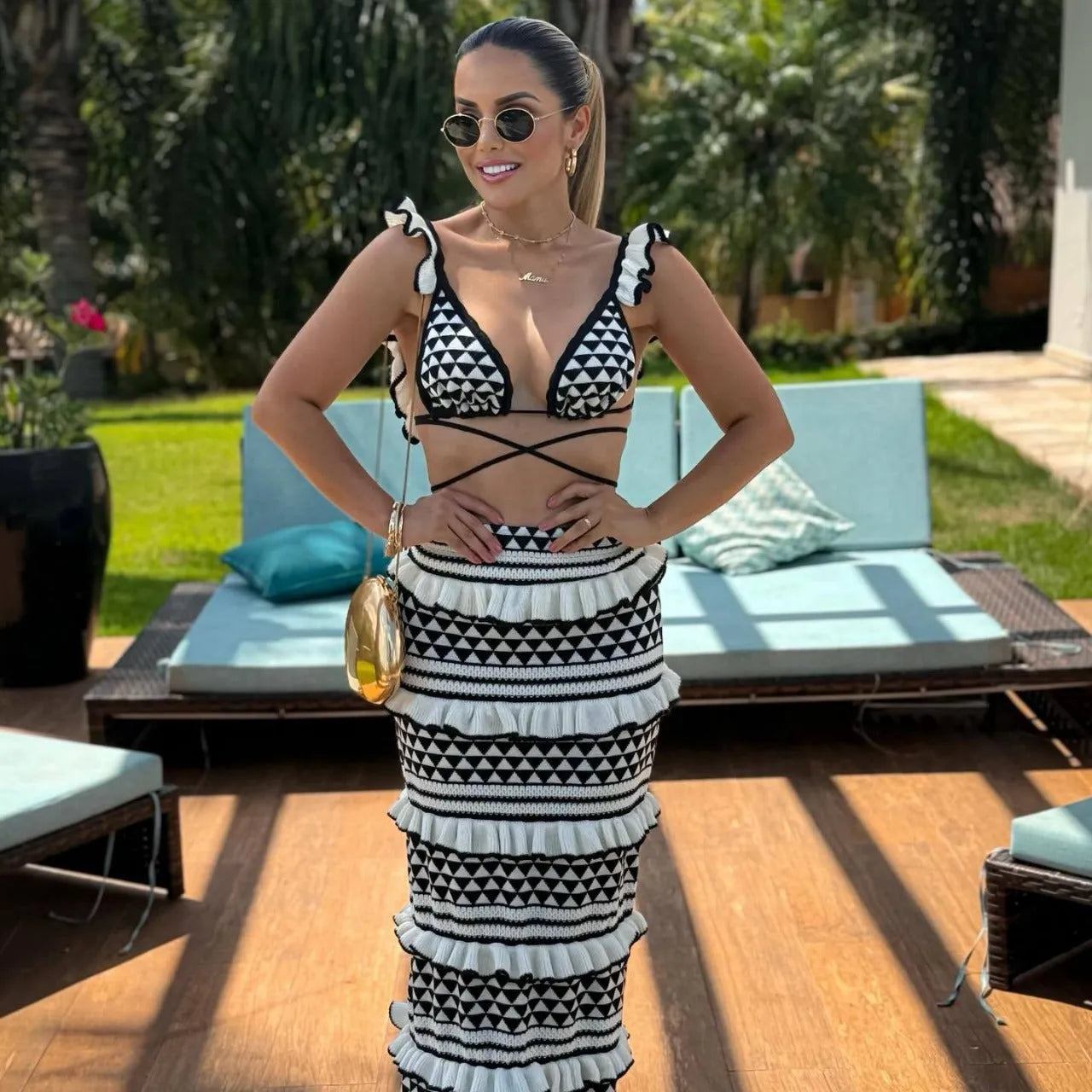 Women's black and white striped cotton bikini top with ruffled spaghetti straps and matching long knitted skirt
