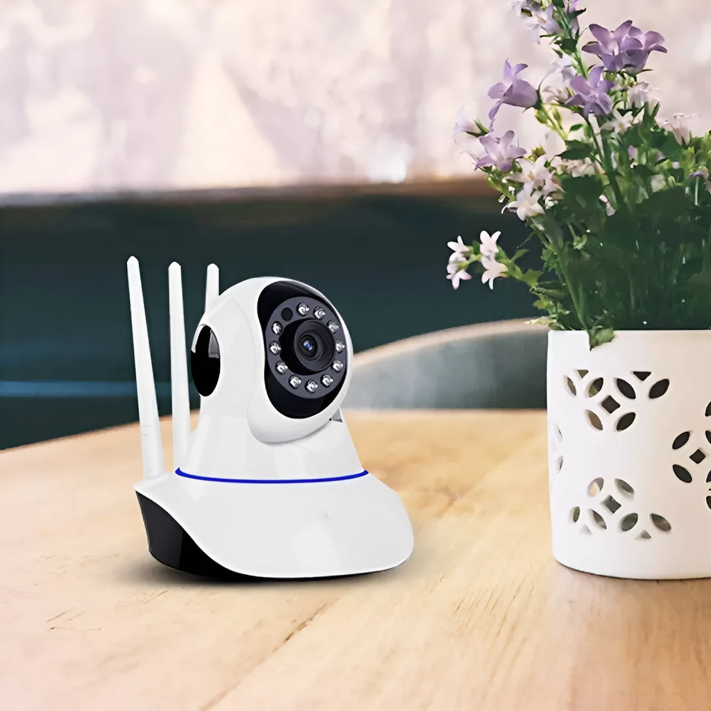 White wireless dome security camera on a stand with a 3.6mm lens.