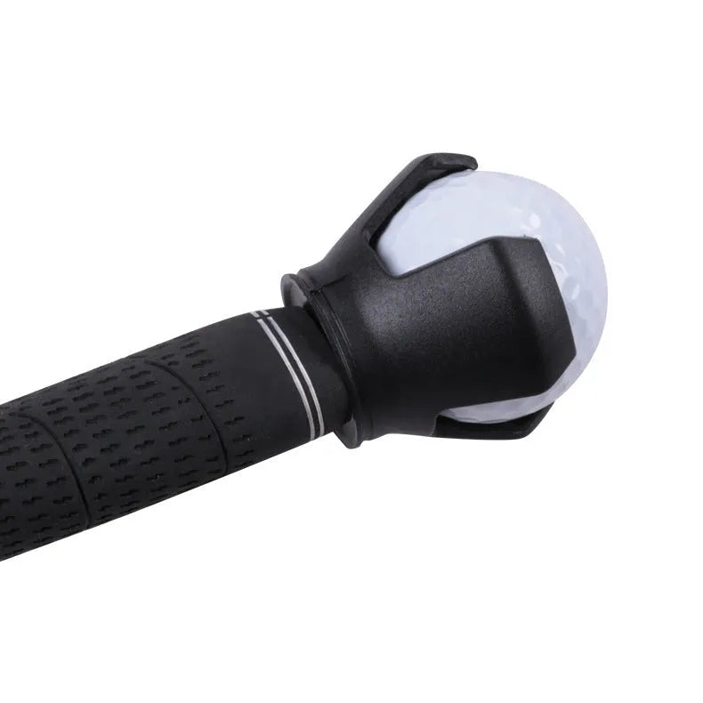 Black golf ball picking device with a clip, shown for use with a putter.