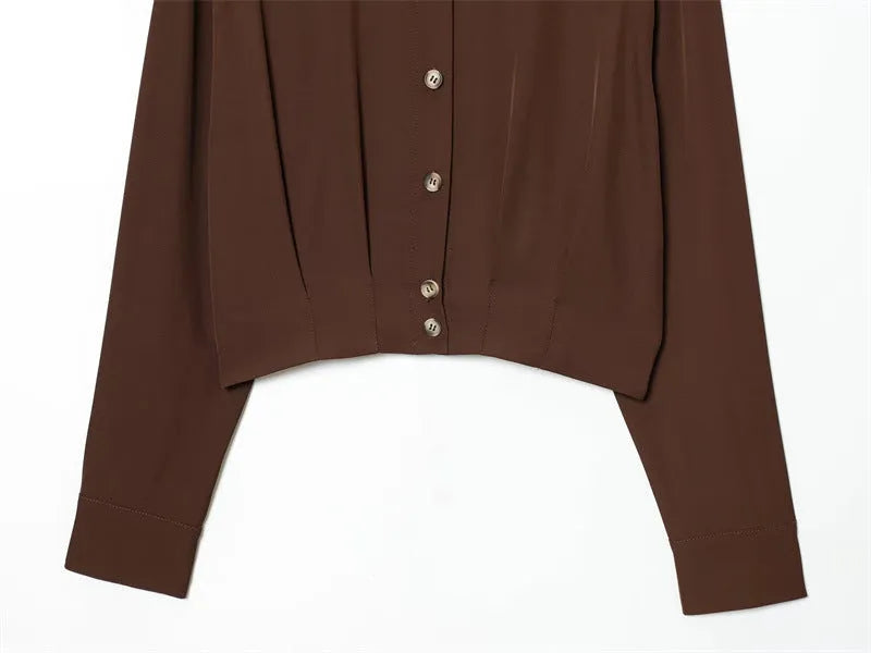 Women's loose fit brown polyester shirt with all-over plants and flowers print, shoulder strap style, front view