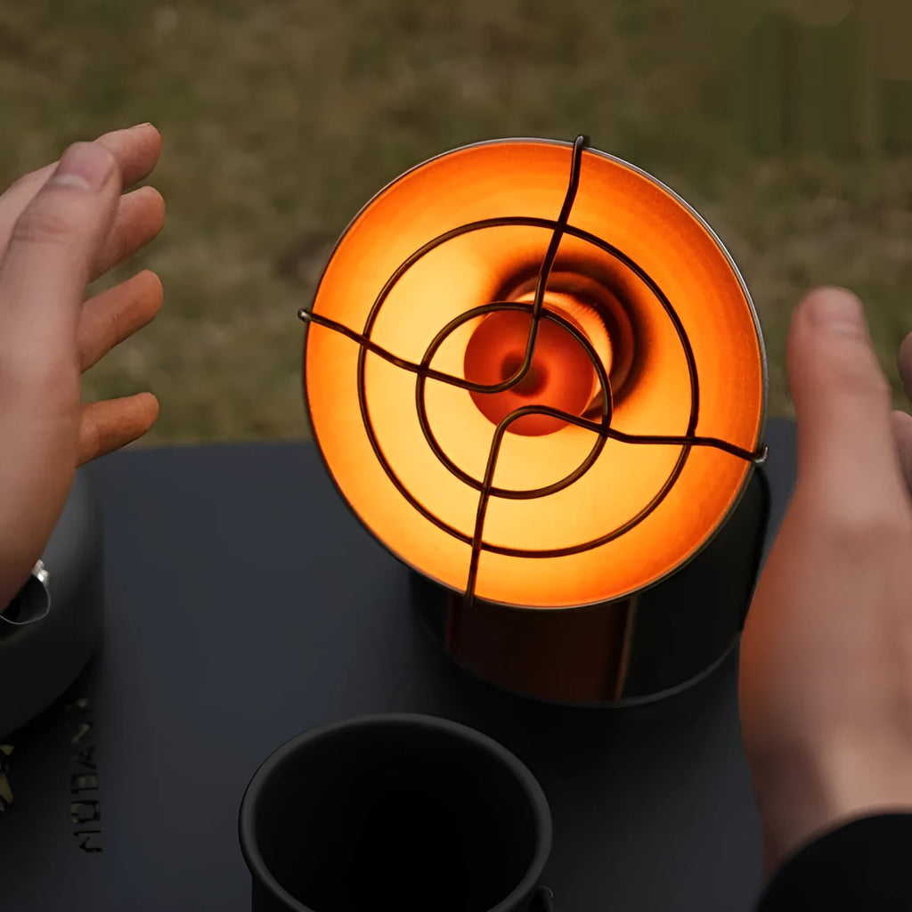 Black and orange portable gas heating stove for outdoor camping