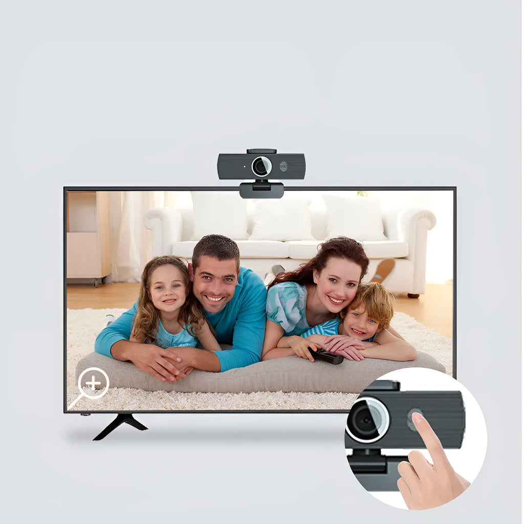 Black 4K USB webcam with auto focus on a desktop, shown with its magnetic privacy cover.