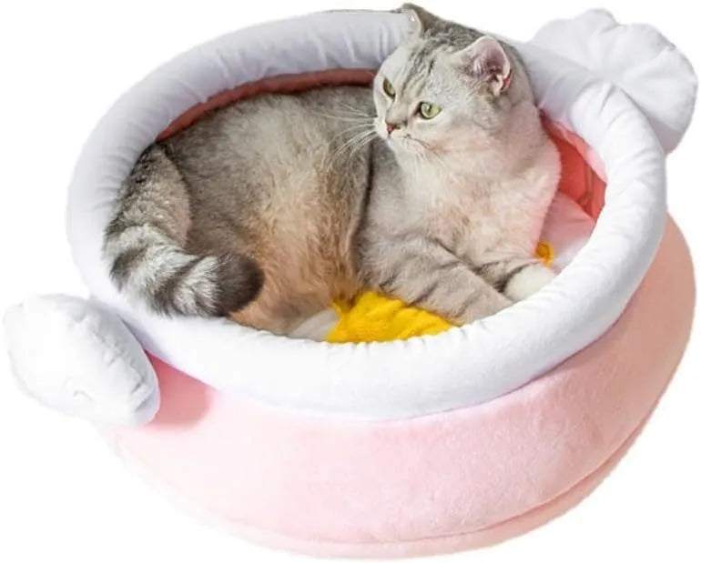 Pink honey pot-shaped enclosed cat sofa bed with a soft fabric exterior and a removable cushion.