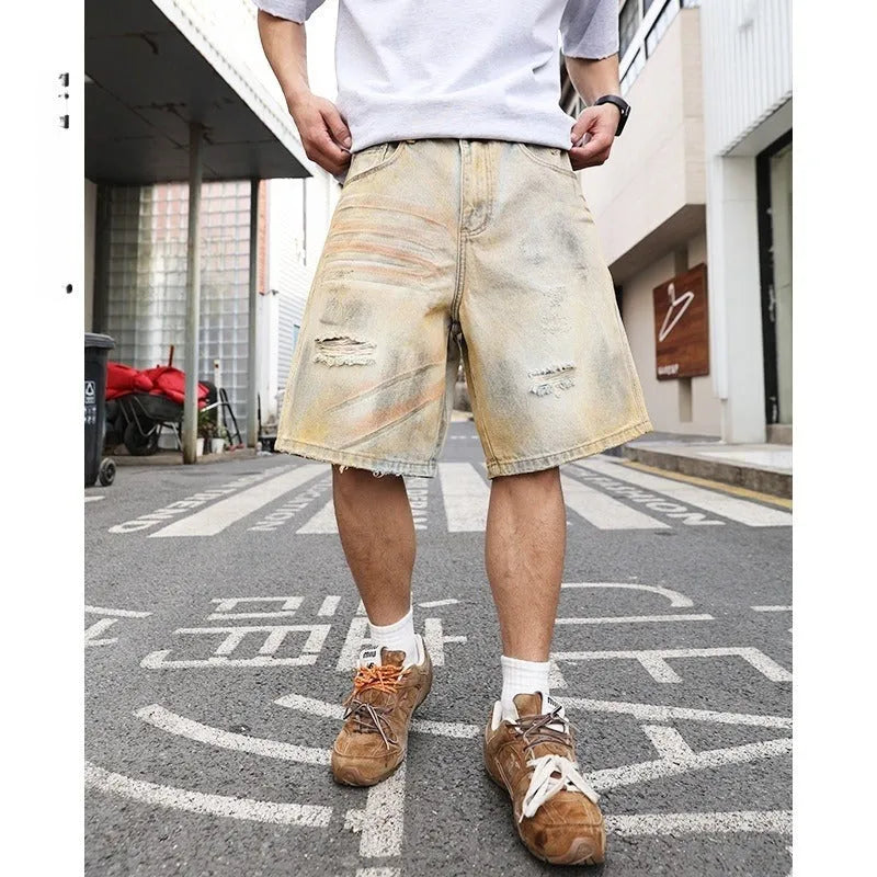 Light blue men's denim shorts with ripped details and a straight-leg fit