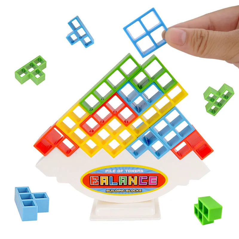 Plastic balance stacking game with colourful building blocks on chassis for family play