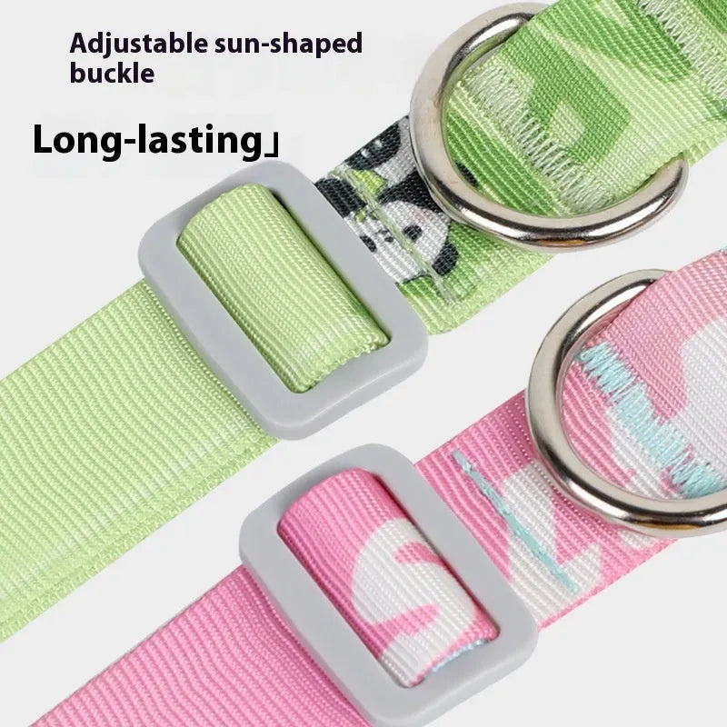 Adjustable nylon dog collar with a colourful cartoon gradient print and a metal D-ring, shown in panda green.