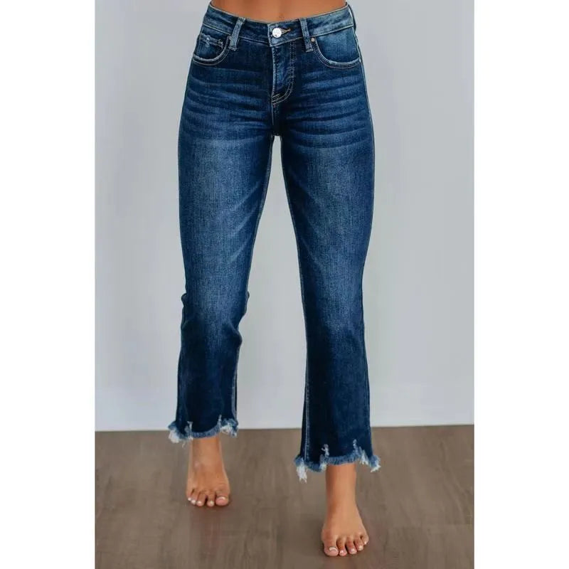 Solid colour women's denim trousers with a hand-worn finish in dark blue and light blue.