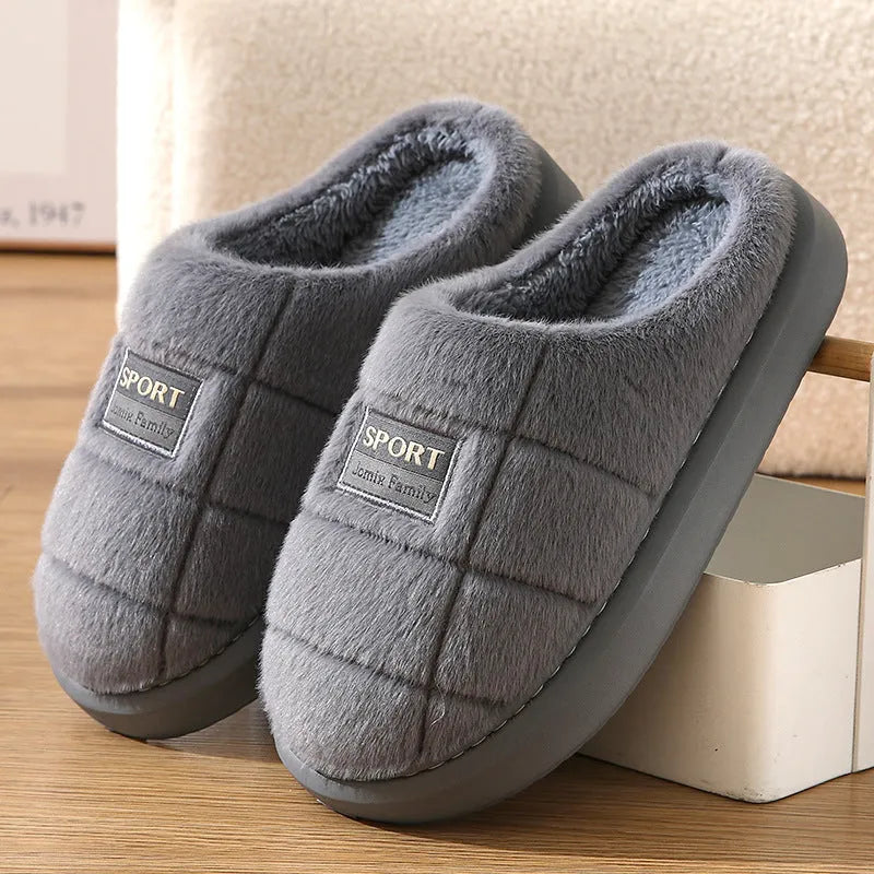 Men's grey and brown plaid winter slippers with a thick sole and rabbit hair trim.