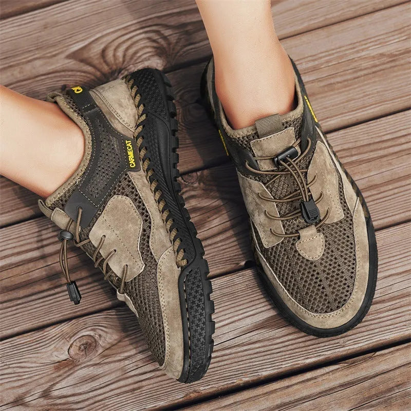 Men's brown suede tennis shoes with elastic band closure and hand-stitched rubber soles