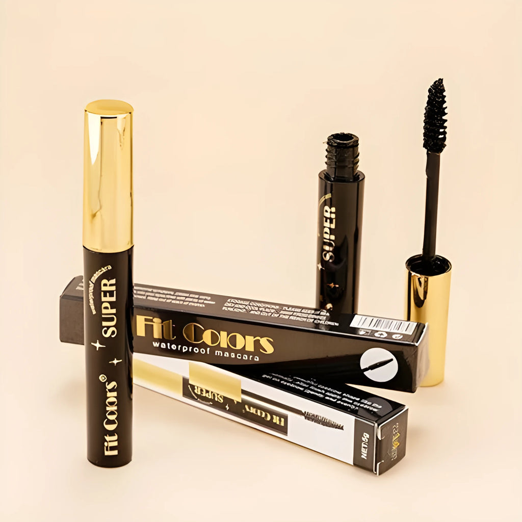 Christmas stage mascara tube with wand, shown in multiple colour options including gold, purple, and wine red