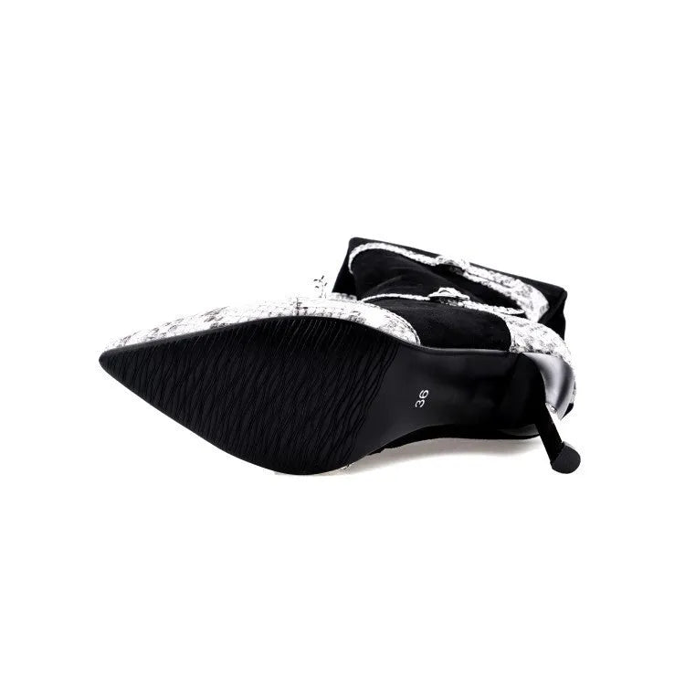 Grey and black women's knee-high boots with a thin high heel on a rubber sole.