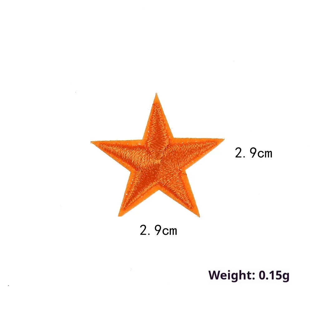 Colourful five-pointed star cloth embroidery stickers for DIY clothing decoration on a fabric background.