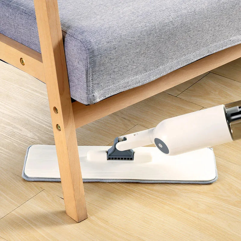 Flat squeeze mop with bucket wringing system showing 360-degree rotation and stainless steel construction
