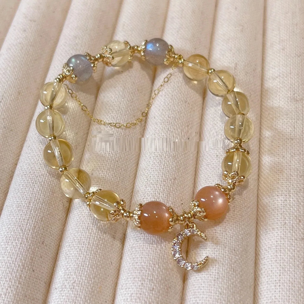 Chinese style women's crystal bracelet with diamond shaped stones and electroplated 14K gold gilded finish in citrine moon colour