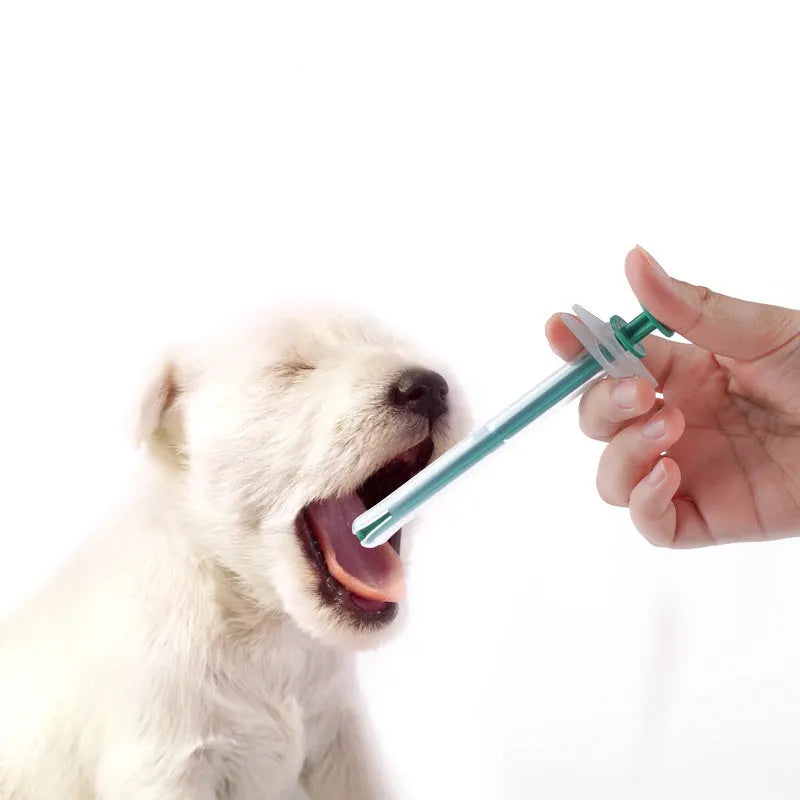 Two silicone pet pill shooters with soft tips for medication administration