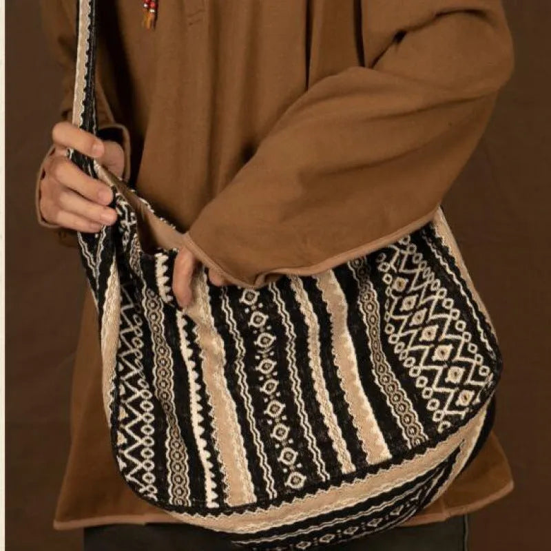 Retro striped corduroy messenger bag with adjustable shoulder strap showing jacquard pattern