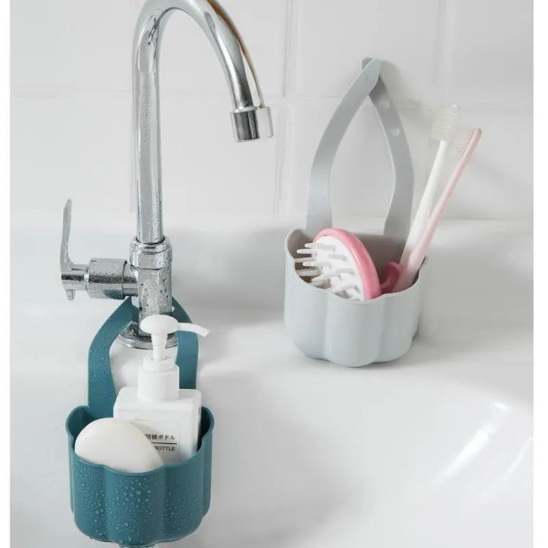 Nordic style plastic kitchen sink basket in dark blue measuring 20cm by 10cm