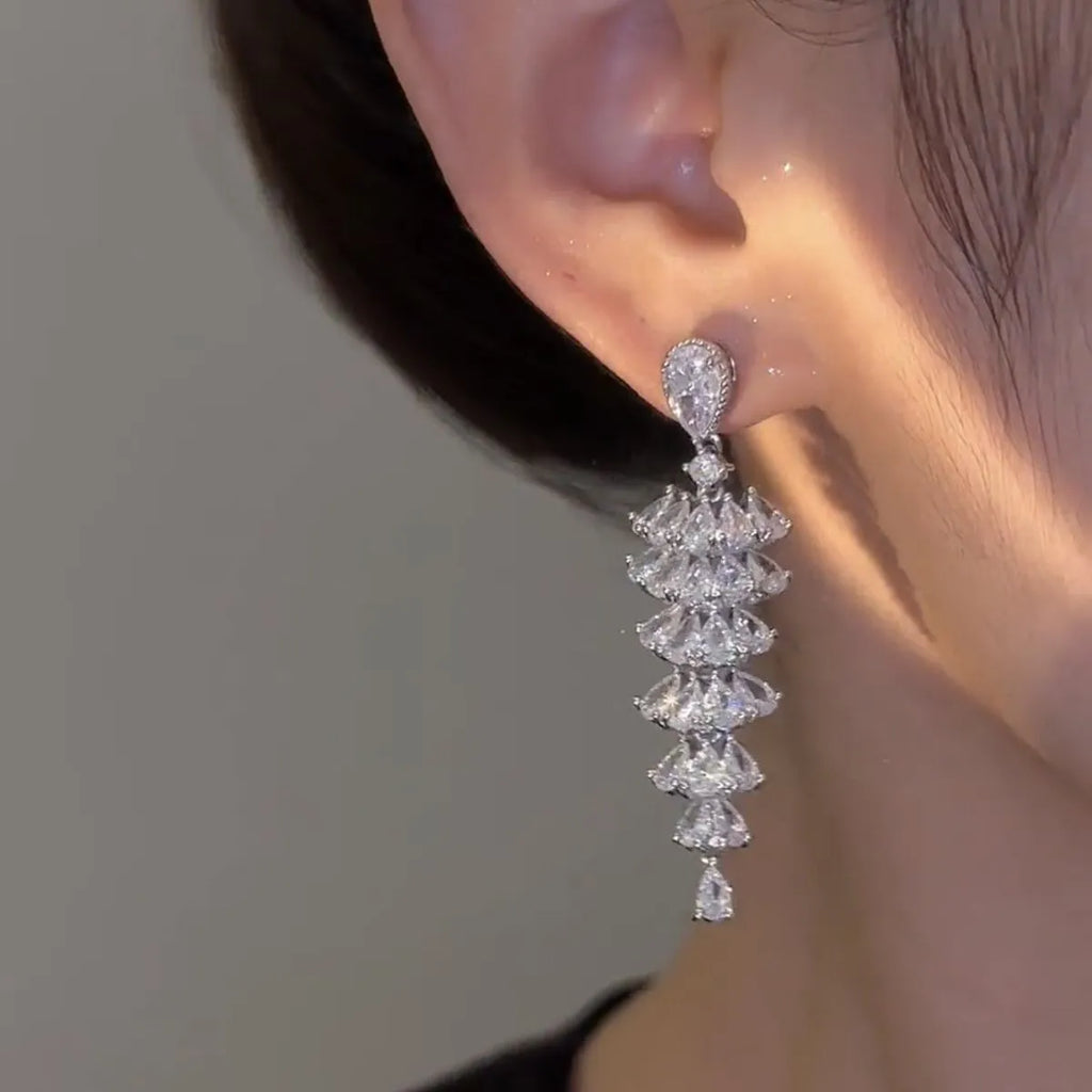 Christmas tree drop earrings with zircon stones in silver pagoda colour