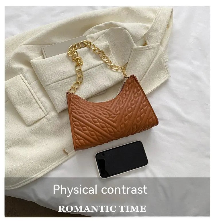 Brown pleated PU chain baguette shoulder bag showing square shape and soft handles.