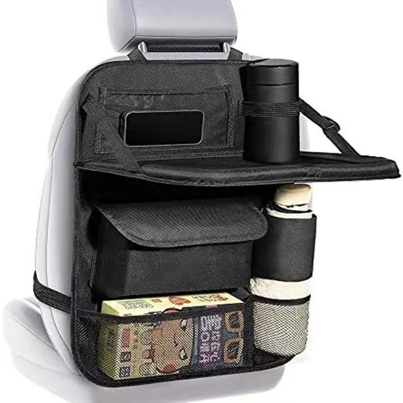 Black Oxford cloth buggy bag hanging behind car seat with dimensions 42x30 cm