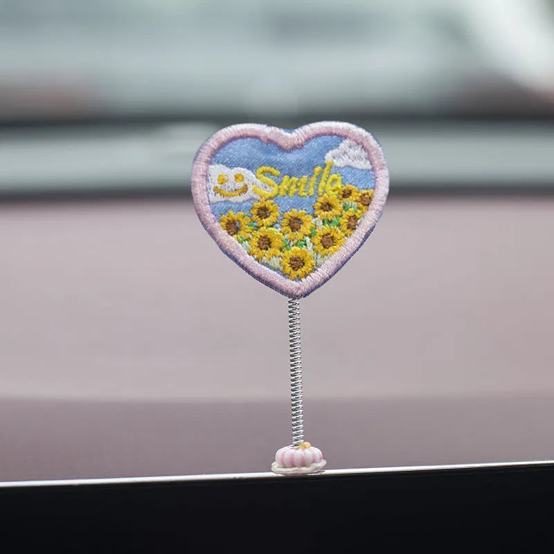 Set of six small PVC cartoon duckling car decorations with hello sign on car dashboard