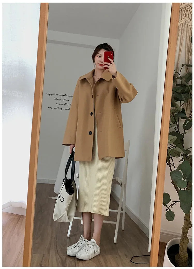Women's Korean-style loose overcoat in solid colour with long sleeves, available in khaki or black