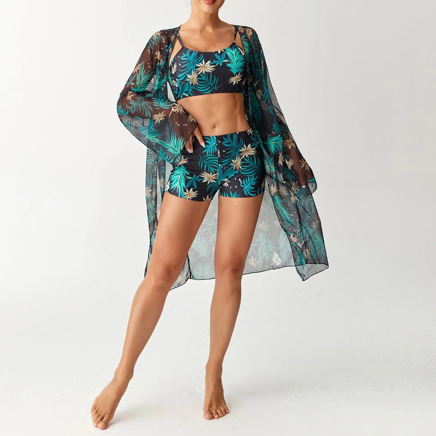 Women's three-piece swimsuit set with long sleeve blouse in pink, black, white, and sapphire blue